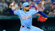 Aug 4, 2024; Arlington, Texas, USA; Texas Rangers starting pitcher Nathan Eovaldi (17) throws during the first inning against the Boston Red Sox at Globe Life Field. 