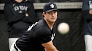 Feb 16, 2025; Tampa, FL, USA; New York Yankees pitcher Gerrit Cole (45)  throws a pitch during spring training at George M. Steinbrenner Field. Mandatory Credit: Jonathan Dyer-Imagn Images