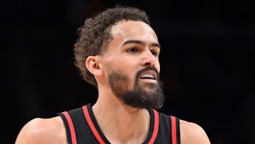 Trae Young #11 of the Atlanta Hawks reacts against the Charlotte Hornets.