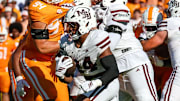 Mississippi State Bulldogs running back Fluff Bothwell (24) runs with the ball against the Tennessee Volunteers during the first half at Davis Wade Stadium at Scott Field.