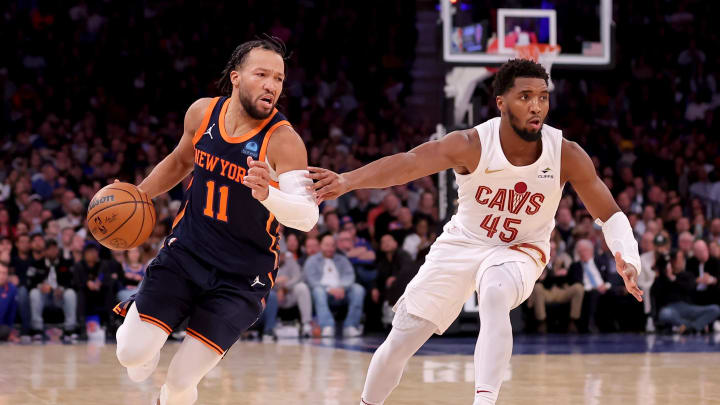 Nov 1, 2023; New York, New York, USA; New York Knicks guard Jalen Brunson (11) controls the ball against Cleveland Cavaliers guard Donovan Mitchell (45) during the fourth quarter at Madison Square Garden. Mandatory Credit: Brad Penner-USA TODAY Sports