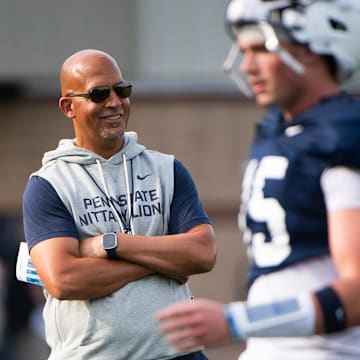 Penn State football head coach James Franklin smiles during a practice session outside Holuba Hall.