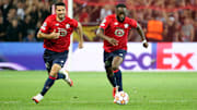 Jonathan Ikone et Mehmet Zeki Celik face à Wolsburg (0-0).