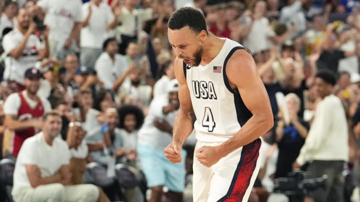 United States shooting guard Stephen Curry (4) celebrates during the second half against Serbia in a men's basketball semifinal game during the Paris 2024 Olympic Summer Games at Accor Arena. Mandatory Credit: