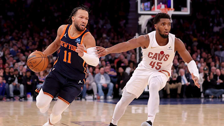 Nov 1, 2023; New York, New York, USA; New York Knicks guard Jalen Brunson (11) controls the ball against Cleveland Cavaliers guard Donovan Mitchell (45) during the fourth quarter at Madison Square Garden. Mandatory Credit: Brad Penner-Imagn Images