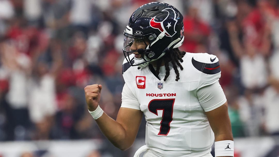 Houston Texans quarterback C.J. Stroud (7) celebrates after throwing a touchdown pass during the first quarter against the Tampa Bay Buccaneers at NRG Stadium.