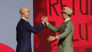 Jun 26, 2024; Brooklyn, NY, USA; Reed Sheppard shakes hands with NBA commissioner Adam Silver after being selected in the first round by the Houston Rockets in the 2024 NBA Draft at Barclays Center. Mandatory Credit: Brad Penner-USA TODAY Sports