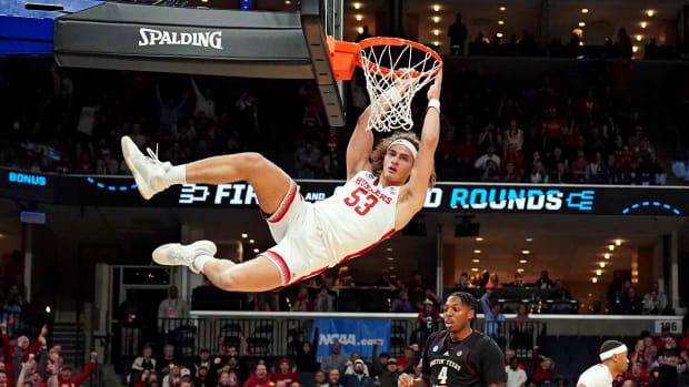 Nebraska Cornhuskers forward Josiah Allick dunks the ball against the Texas A&M Aggies in the 2024 NCAA Tournament.