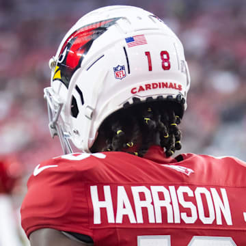 Aug 10, 2024; Glendale, Arizona, USA; Detailed view of the jersey of Arizona Cardinals wide receiver Marvin Harrison Jr. (18) against the New Orleans Saints during a preseason NFL game at State Farm Stadium. Mandatory Credit: Mark J. Rebilas-Imagn Images
