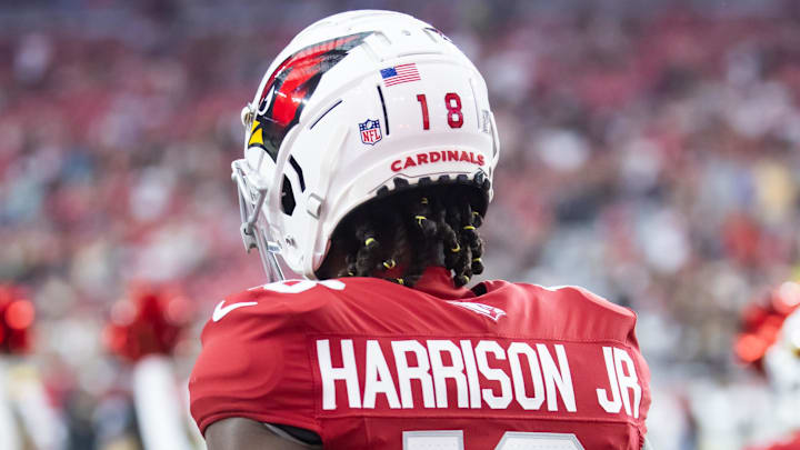 Aug 10, 2024; Glendale, Arizona, USA; Detailed view of the jersey of Arizona Cardinals wide receiver Marvin Harrison Jr. (18) against the New Orleans Saints during a preseason NFL game at State Farm Stadium. Mandatory Credit: Mark J. Rebilas-Imagn Images
