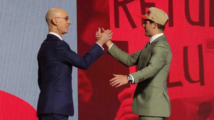 Jun 26, 2024; Brooklyn, NY, USA; Reed Sheppard shakes hands with NBA commissioner Adam Silver after being selected in the first round by the Houston Rockets in the 2024 NBA Draft at Barclays Center. Mandatory Credit: Brad Penner-USA TODAY Sports