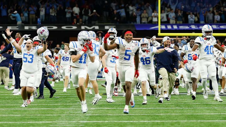 Ole Miss players celebrate their Sugar Bowl win over Georgia to advance to the College Football Playoff semifinals.