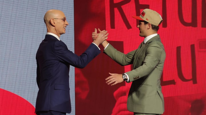 Jun 26, 2024; Brooklyn, NY, USA; Reed Sheppard shakes hands with NBA commissioner Adam Silver after being selected in the first round by the Houston Rockets in the 2024 NBA Draft at Barclays Center. Mandatory Credit: Brad Penner-USA TODAY Sports