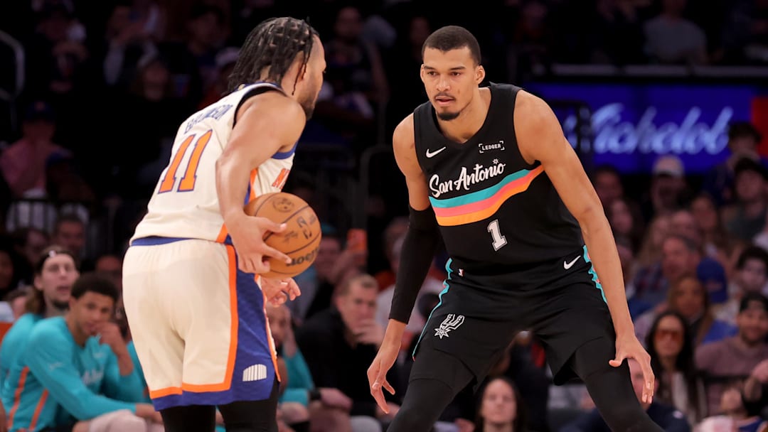 Mar 1, 2026; New York, New York, USA; San Antonio Spurs forward Victor Wembanyama (1) defends New York Knicks guard Jalen Brunson (11) during the third quarter at Madison Square Garden.