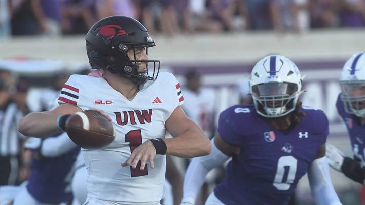 Incarnate Word quarterback Zach Calzada (1) looks to throw against the ACU defense. The Cardinals beat ACU 27-20 in the non-conference game Saturday, Sept. 16, 2023, at Wildcat Stadium in Abilene.