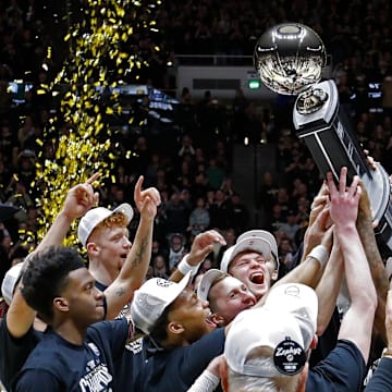 Purdue Boilermakers celebrate after winning the Big Ten regular season championship 