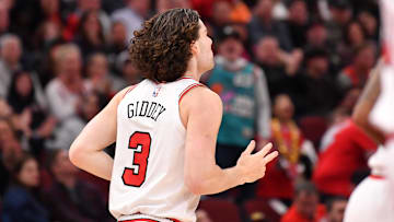 Feb 28, 2025; Chicago, Illinois, USA; Chicago Bulls guard Josh Giddey (3) reacts after hitting a three point sho