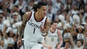 Mar 5, 2025; Storrs, Connecticut, USA; UConn Huskies guard Solo Ball (1) reacts after his three point basket against the Marquette Golden Eagles in the first half at Harry A. Gampel Pavilion. Mandatory Credit: David Butler II-Imagn Images