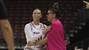 Halle Douglass gets a hug from Wisconsin coach Marisa Moseley on Senior Day on Sunday, March 3, 2024, at the Kohl Center in Madison, Wis.