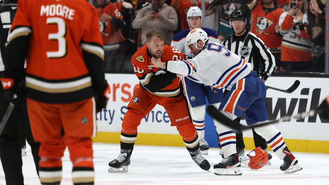 Apr 24, 2026; Anaheim, California, USA;  Anaheim Ducks left wing Jeffrey Viel (28) and Edmonton Oilers right wing Vasily Podkolzin (92) fight during the third period of game three of the first round of the 2026 Stanley Cup Playoffs at Honda Center. Mandatory Credit: Kiyoshi Mio-Imagn Images