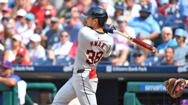 Steven Kwan watches a home run he hit 