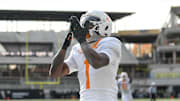 Nov 30, 2024; Nashville, Tennessee, USA;  Tennessee Volunteers wide receiver Dont'e Thornton Jr. (1) blows a kiss to the Tennessee Volunteers fans in the stands after his touchdown catch against the Vanderbilt Commodores during the first half at FirstBank Stadium. Mandatory Credit: Steve Roberts-Imagn Images