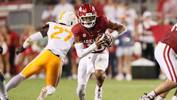 Oct 5, 2024; Fayetteville, Arkansas, USA; Arkansas Razorbacks quarterback Taylen Green (10) rushes in the first quarter against the Tennessee Volunteers at Donald W. Reynolds Razorback Stadium. Mandatory Credit: Nelson Chenault-Imagn Images