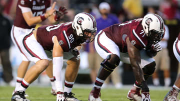 Sep 6, 2014; Columbia, SC, USA;  South Carolina Gamecocks tight end Cody Gibson (90) and offensive tackle Brandon Shell (71) line up during  game action between the South Carolina Gamecocks and East Carolina Pirates at Williams-Brice Stadium. South Carolina wins 33-23 over East Carolina. Mandatory Credit: Jim Dedmon-USA TODAY Sports