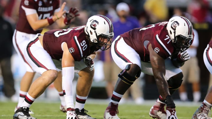 Sep 6, 2014; Columbia, SC, USA;  South Carolina Gamecocks tight end Cody Gibson (90) and offensive tackle Brandon Shell (71) line up during  game action between the South Carolina Gamecocks and East Carolina Pirates at Williams-Brice Stadium. South Carolina wins 33-23 over East Carolina. Mandatory Credit: Jim Dedmon-USA TODAY Sports