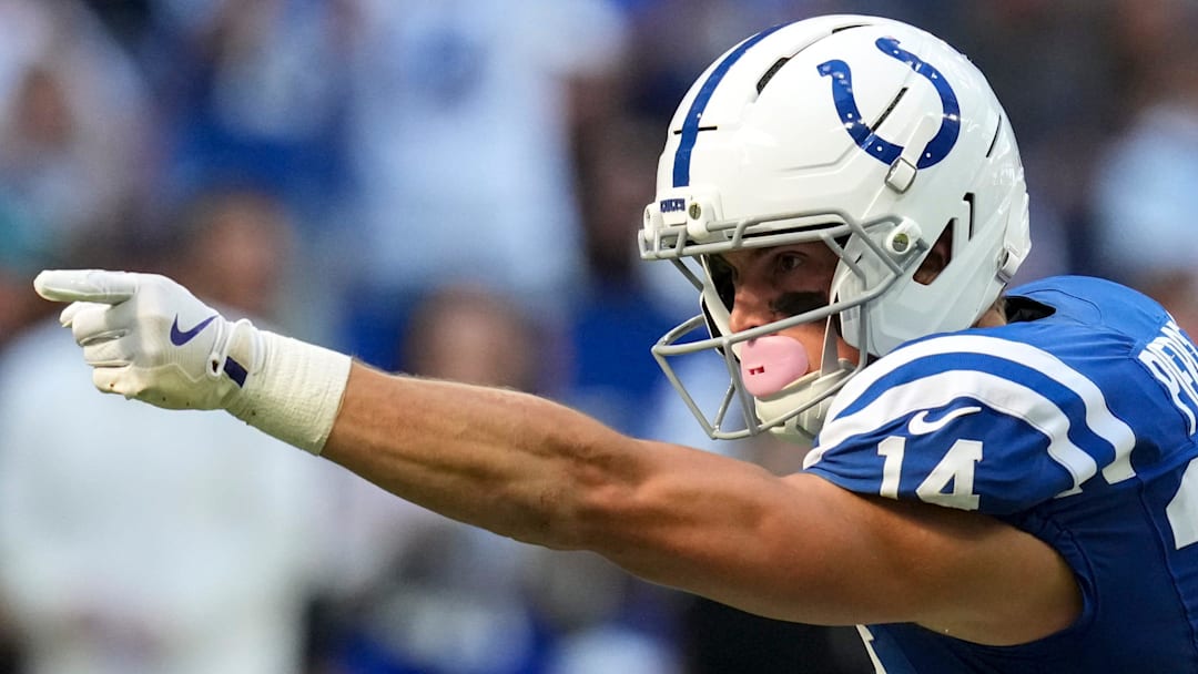 Indianapolis Colts wide receiver Alec Pierce (14) signals a first down during a game against the Arizona Cardinals on Sunday, Oct. 12, 2025, at Lucas Oil Stadium in Indianapolis. The Colts defeated the Cardinals 31-27.