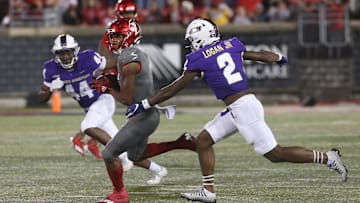 Louisville   s Tyler Hudson catches the ball against James Madison   s Chauncey Logan.  Nov. 5, 2022

Louisvillejamesmadison 26