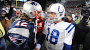 Indianapolis Colts quarterback Peyton Manning, right, meets with New England Patriots quarterback Tom Brady after a game at Gillette Stadium on Nov. 21, 2010. The Colts lost 31-28.
