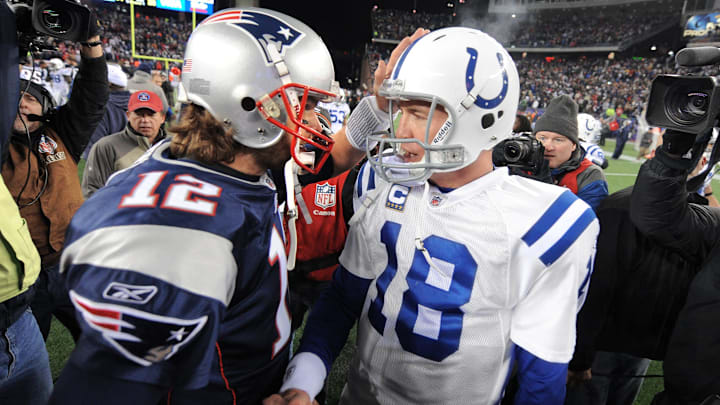 Indianapolis Colts quarterback Peyton Manning meets with New England Patriots quarterback Tom Brady after an NFL game Indianapolis Colts quarterback Peyton Manning meets with New England Patriots quarterback Tom Brady after an NFL game