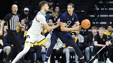 Penn State Nittany Lions forward Yanic Konan Niederhauser (14)
