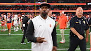 Aug 31, 2024; Syracuse, New York, USA; Syracuse Orange head coach Fran Brown walks on the field after a game against the Ohio Bobcats at the JMA Wireless Dome. Mandatory Credit: Rich Barnes-Imagn Images