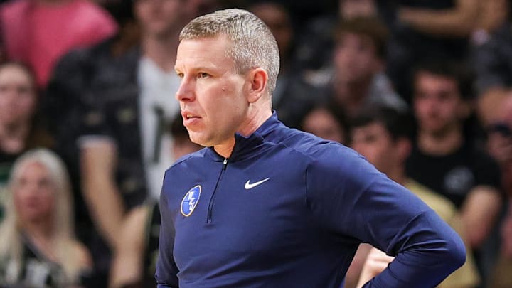 Feb 14, 2026; Orlando, Florida, USA; West Virginia Mountaineers head coach Ross Hodge during the first half against the UCF Knights at Addition Financial Arena. Mandatory Credit: Mike Watters-Imagn Images
