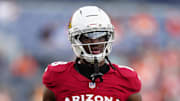 Aug 16, 2025; Denver, Colorado, USA; Arizona Cardinals wide receiver Marvin Harrison Jr. (18) before the game against the Denver Broncos at Empower Field at Mile High. Mandatory Credit: Ron Chenoy-Imagn Images