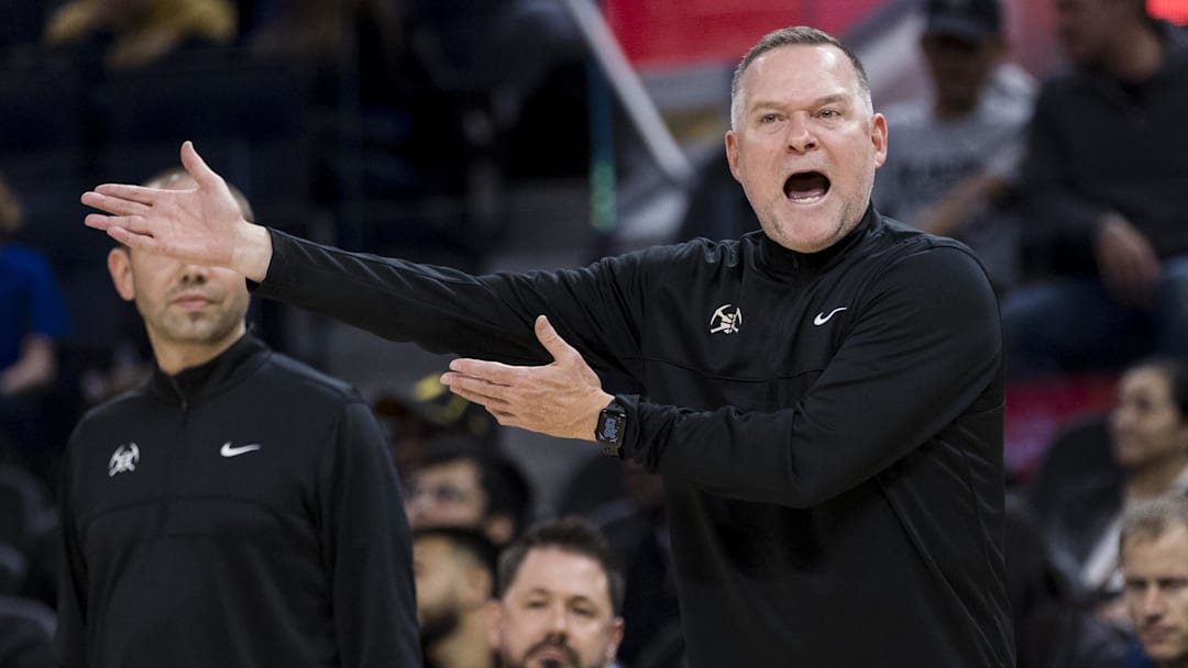 Oct 14, 2022; San Francisco, California, USA;  Denver Nuggets head coach Mike Malone reacts after he is called for a foul during the first half of the game against the Golden State Warriors at Chase Center. Mandatory Credit: John Hefti-Imagn Images