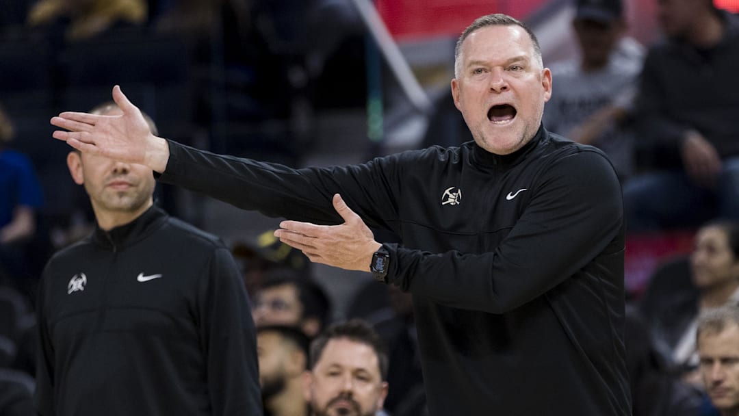 Oct 14, 2022; San Francisco, California, USA;  Denver Nuggets head coach Mike Malone reacts after he is called for a foul during the first half of the game against the Golden State Warriors at Chase Center. Mandatory Credit: John Hefti-Imagn Images