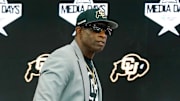 Jul 9, 2025; Frisco, TX, USA; Colorado head coach Deion Sanders walks onto the stage during 2025 Big 12 Football Media Days at The Star. Mandatory Credit: Raymond Carlin III-Imagn Images