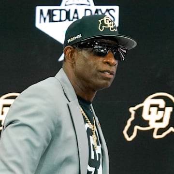 Jul 9, 2025; Frisco, TX, USA; Colorado head coach Deion Sanders walks onto the stage during 2025 Big 12 Football Media Days at The Star. Mandatory Credit: Raymond Carlin III-Imagn Images