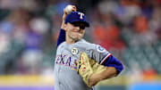 Texas Rangers starting pitcher Jack Leiter (35) delivers a pitch against the Houston Astros during the first inning at Daikin Park. 