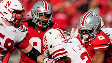 Ohio State Buckeyes linebacker Cody Simon (0) tackles Nebraska Cornhuskers running back Emmett Johnson (21) during the second half.