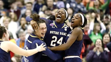 Former Notre Dame stars Marina Mabrey, Arike Ogunbowale and Jackie Young celebrate winning in the Final Four in 2018.