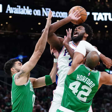 May 3, 2023; Boston, Massachusetts, USA; Boston Celtics forward Jayson Tatum (0) and center Al Horford (42) defend against Philadelphia 76ers center Joel Embiid (21) in the first quarter during game two of the 2023 NBA playoffs at TD Garden. Mandatory Credit: David Butler II-USA TODAY Sports