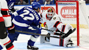 Oct 9, 2025; Tampa, Florida, USA; Tampa Bay Lightning right wing Oliver Bjorkstrand (22) scores a goal on Ottawa Senators goaltender Linus Ullmark (35) during the first period at Benchmark International Arena. Mandatory Credit: Kim Klement Neitzel-Imagn Images