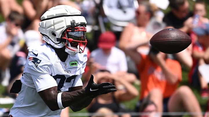 Aug 03, 2024; Foxborough, MA, USA; New England Patriots wide receiver Jalen Reagor (83) makes a catch during training camp at Gillette Stadium.