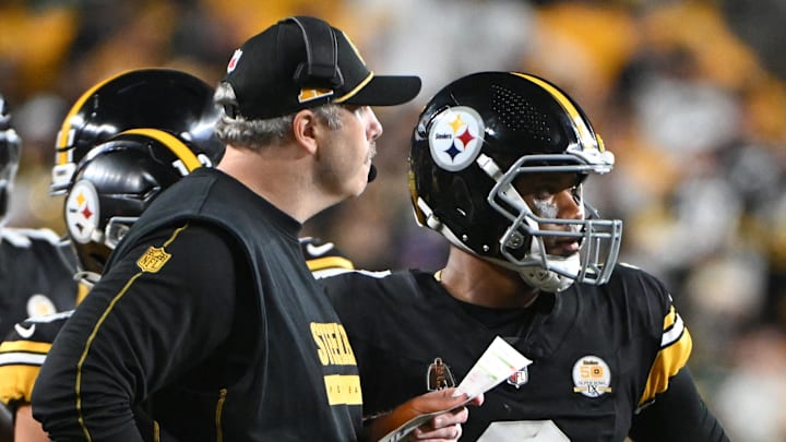 Pittsburgh Steelers offensive coordinator Arthur Smith stands on the sidelines with quarterback Russell Wilson. Pittsburgh Steelers offensive coordinator Arthur Smith stands on the sidelines with quarterback Russell Wilson.