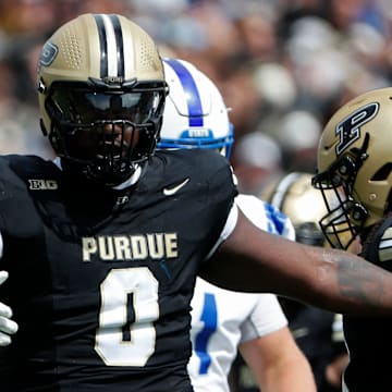 Purdue Boilermakers defensive lineman Jeffrey M'Ba (0) celebrates after a defensive stop 