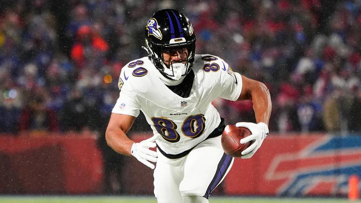 Jan 19, 2025; Orchard Park, New York, USA; Baltimore Ravens tight end Isaiah Likely (80) runs the ball after making a catch during the first quarter against the Buffalo Bills in a 2025 AFC divisional round game at Highmark Stadium. Mandatory Credit: Gregory Fisher-Imagn Images